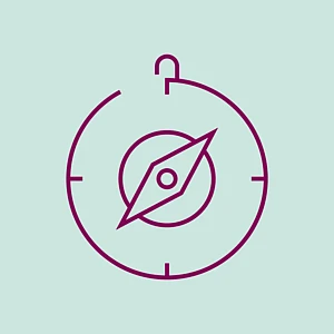 Ein burgunderfarbenes Icon eines Kompass auf türkisfarbenem Grund