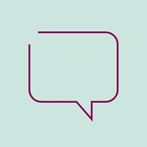 Ein burgunderfarbenes Icon einer Sprechblase auf türkisfarbenem Grund